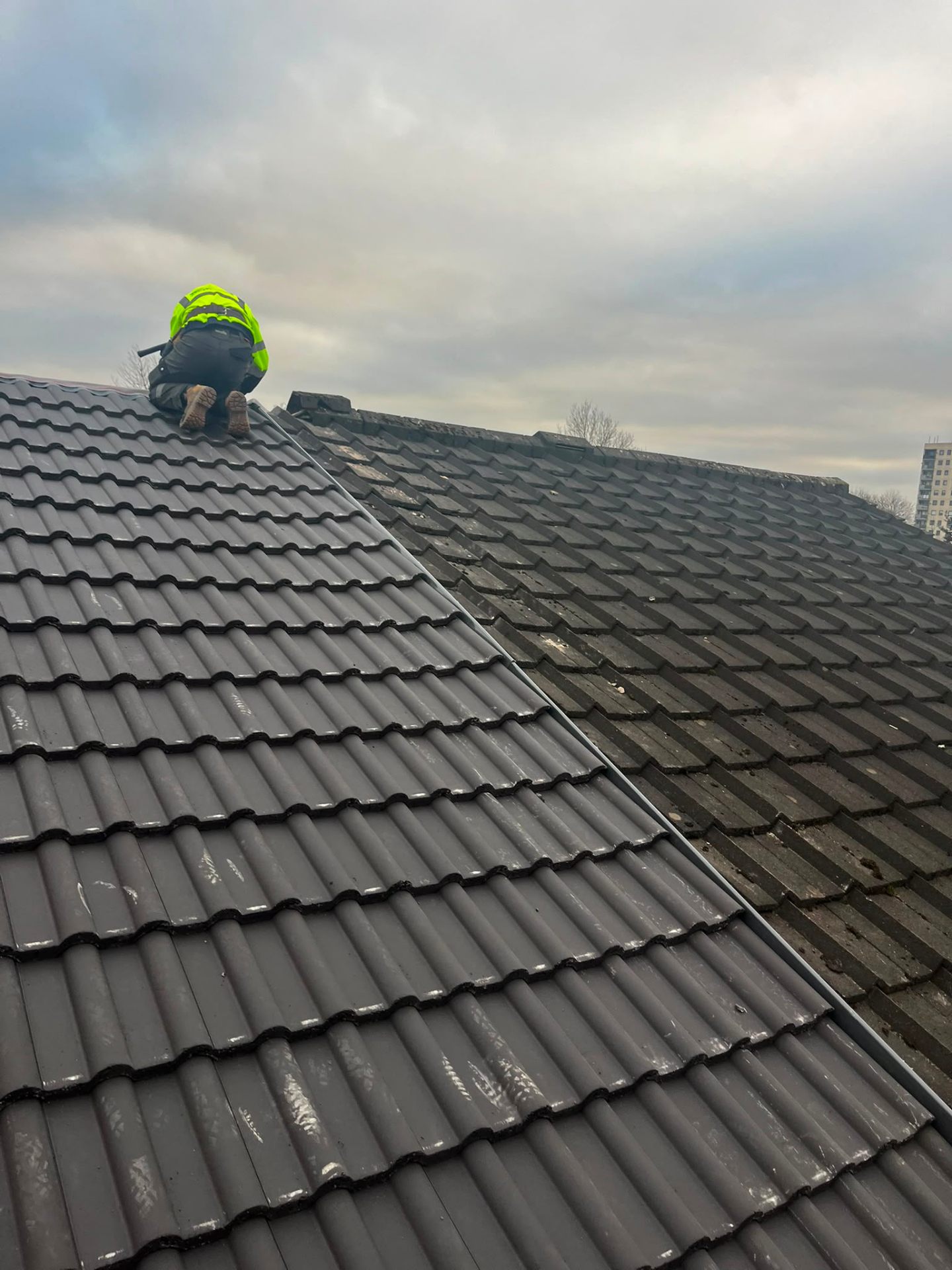 RTC Roofing van and cherry-picker attending an emergency roof call-out at a Liverpool Victorian terrace